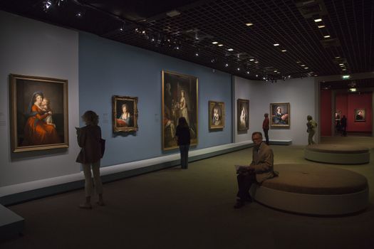 FRANCE, Paris: Some visitors make a tour in the first exhibition of �lisabeth Louise Vig�e Le Brun in France in Le Grand Palais, in Paris on September 21, 2015. �lisabeth Louise Vig�e Le Brun (1755-1842) is one of the greater portrait painter of her time. She was chosen to paint the very famous queen of France Marie-Antoinette. 