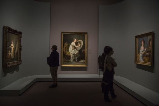 FRANCE, Paris: Some visitors watch a portrait of �lisabeth Louise Vig�e Le Brun in Le Grand Palais, in Paris on September 21, 2015. �lisabeth Louise Vig�e Le Brun (1755-1842) is one of the greater portrait painter of her time. She was chosen to paint the very famous queen of France Marie-Antoinette. 