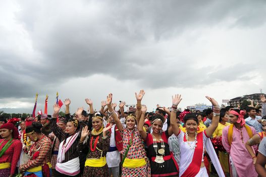 NEPAL, Kathmandu: Celebrations continued in Kathmandu, Nepal on September 21, 2015, one day after the government unveiled the country's first democratic constitution in a historic step. Out of the 598 members of the Constituent Assembly, 507 voted for the new constitution, 25 voted against, and 66 abstained in a vote on September 16, 2015. The event was marked with fireworks and festivities, but also with protests organized by parties of the Tharu and Madhesi ethnic communities.Photos taken by Newzulu contributor Narayan Maharjan show the Nepalese people donning traditional garb and celebrating with folk music and dancing.