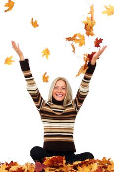 Happy young woman drop up autumn leaves, isolated on white