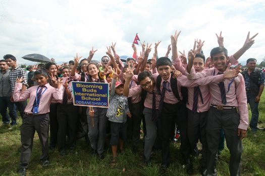 NEPAL, Kathmandu: Students attend celebrations in Kathmandu, Nepal on September 21, 2015, one day after the government unveiled the country's first democratic constitution in a historic step. Out of the 598 members of the Constituent Assembly, 507 voted for the new constitution, 25 voted against, and 66 abstained in a vote on September 16, 2015. The event was marked with fireworks and festivities, but also with protests organized by parties of the Tharu and Madhesi ethnic communities.Photos taken by Newzulu contributor Dinesh Shrestha show the Nepalese people donning traditional garb and celebrating with folk music and dancing.