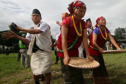 NEPAL, Kathmandu: Performers attend celebrations in Kathmandu, Nepal on September 21, 2015, one day after the government unveiled the country's first democratic constitution in a historic step. Out of the 598 members of the Constituent Assembly, 507 voted for the new constitution, 25 voted against, and 66 abstained in a vote on September 16, 2015. The event was marked with fireworks and festivities, but also with protests organized by parties of the Tharu and Madhesi ethnic communities.Photos taken by Newzulu contributor Dinesh Shrestha show the Nepalese people donning traditional garb and celebrating with folk music and dancing.