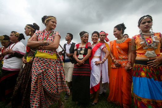 NEPAL, Kathmandu: Women attend celebrations in Kathmandu, Nepal on September 21, 2015, one day after the government unveiled the country's first democratic constitution in a historic step. Out of the 598 members of the Constituent Assembly, 507 voted for the new constitution, 25 voted against, and 66 abstained in a vote on September 16, 2015. The event was marked with fireworks and festivities, but also with protests organized by parties of the Tharu and Madhesi ethnic communities.Photos taken by Newzulu contributor Dinesh Shrestha show the Nepalese people donning traditional garb and celebrating with folk music and dancing.