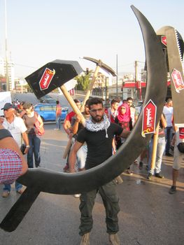 LEBANON, Beirut: A protester takes to the streets of Beirut on September 21, 2015 as part of the #YouStink movement rallying against alleged government corruption.