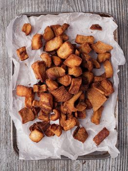 close up of rustic deep fried crispy pork rind