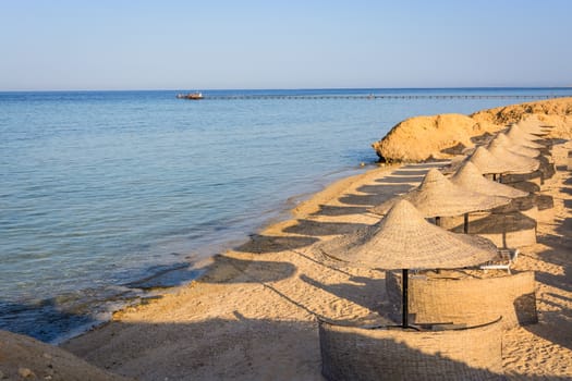 Egyptian parasols on the beach of Red Sea