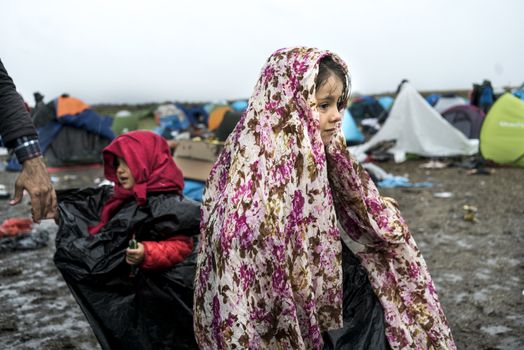 HUNGARY, Roszke: A young girl illustrates the difficulties of living in Hungary's Roszke refugee camp is documented between September 8 and 12, 2015, as Europe's refugee crisis continues. 