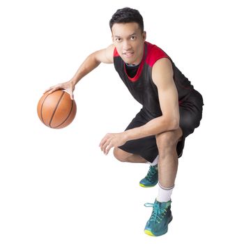 Asian young basketball player on white background