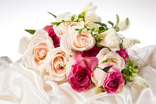 Still life with flowers on a studio background
