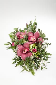 Still life with flowers on a studio background