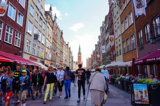 GDANSK, POLAND - JULY 29, 2015: People walking on the street at a traditional yearly market in the city center