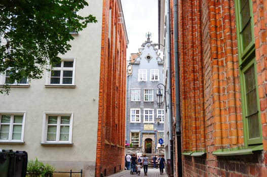 GDANSK, POLAND - JULY 29, 2015: Small inner street at the city center