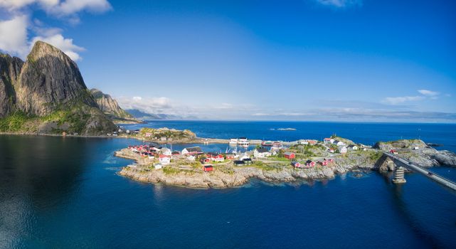 Aerial view of scenic village Hamnoya with traditional red rorbu cabins on Lofoten islands in Norway