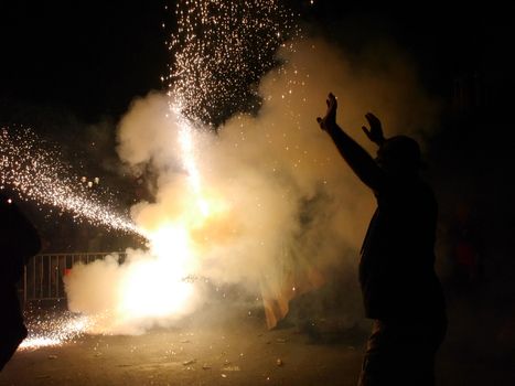 SPAIN, Barcelona; Correfoc, or Firerun, is a traditional Catalan festival held in Barcelona on September 20, 2015, in which groups of people dressed as devils light fireworks. 	The fireworks are directed towards the crowds, and spectators can join in and try to get as close as possible to the fireworks without getting burned. 