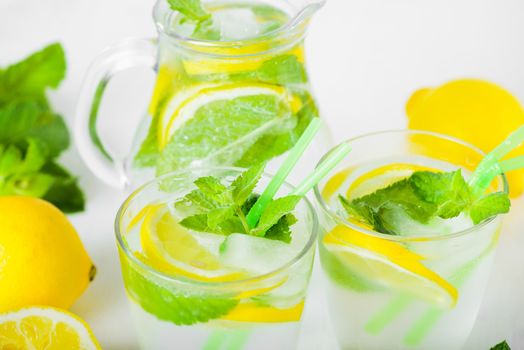 Delicious refreshing lemonade with fresh mint, Lemon, honey and ice. Healthy summer drink.