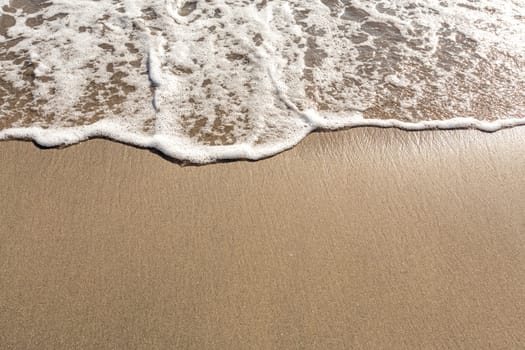 Tropical beach wave close with space for text, Bali, Indonesia