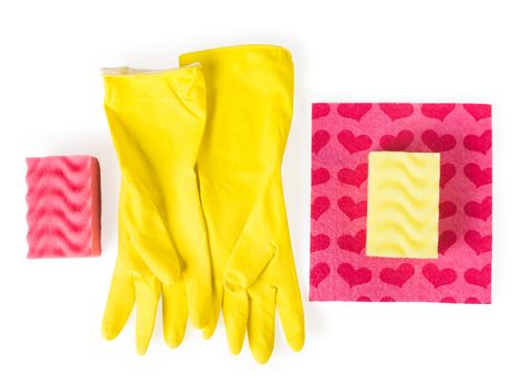 cleaning equipment isolated on a white background: yellow rubber gloves, sponges for washing dishes, cleaning cloths with hearts, the concept of cleaning,  top view