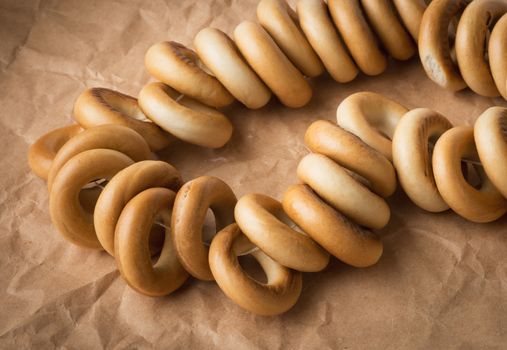 bunch of delicious fresh bagels on a sheet of paper