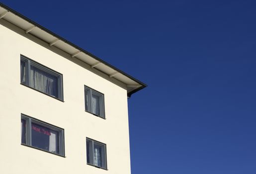 Detail of a modern building with blue sky.