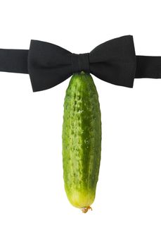 Big cucumber and black bow-tie, like the penis, top view, isolated on white background, close-up