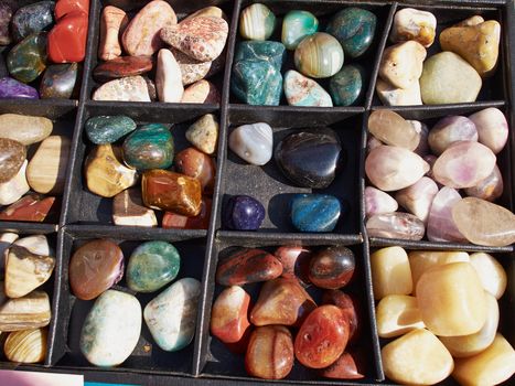 Selection of of semiprecious gemstones for sale in a flea market