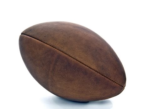Close up shot of old vintage American football on white background