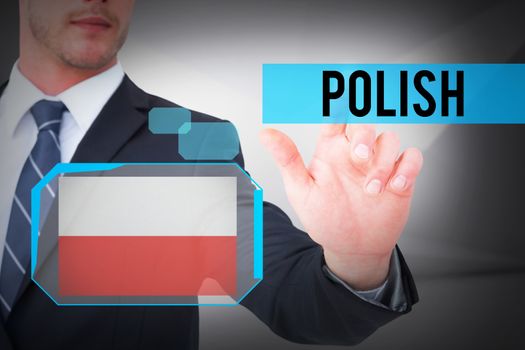The word polish and focused businessman pointing with his finger against abstract white room
