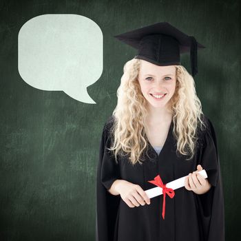 Teenage Girl Celebrating Graduation against green chalkboard