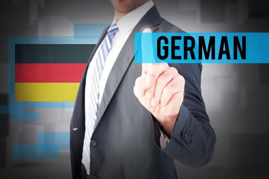 The word german and businessman pointing with his finger against abstract white room