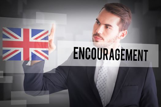 The word encouragement and thoughtful businessman pointing something with his finger against abstract white room