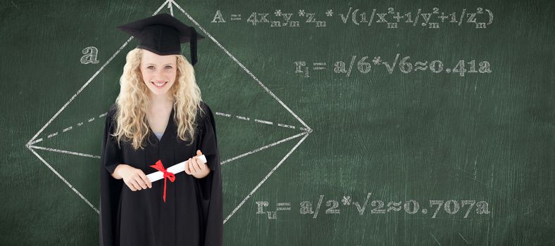 Teenage Girl Celebrating Graduation against green chalkboard
