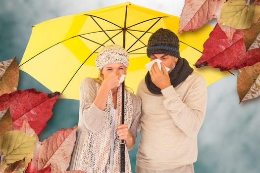 Couple sneezing in tissue while standing under umbrella against low angle view of sky