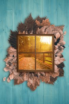 Square shape glass window against autumn leaves pattern