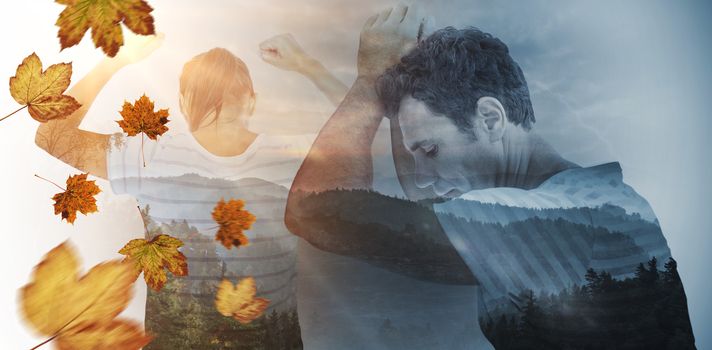 Depressed woman with hands raised against trees and mountain range against cloudy sky