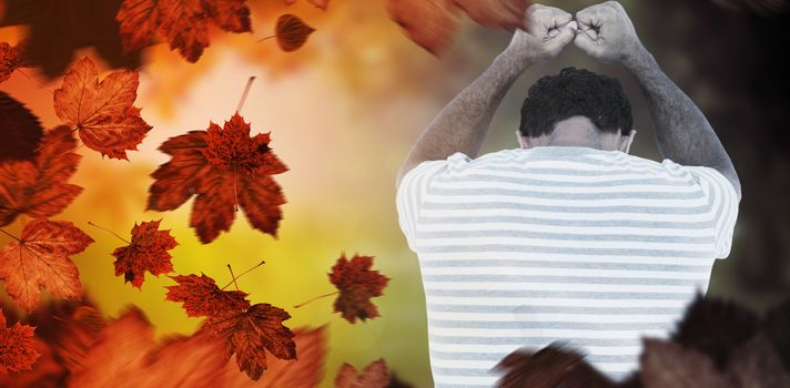 Upset man leaning on white background against autumn scene