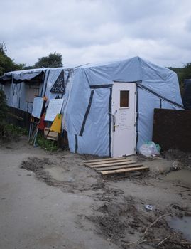 FRANCE, Calais: A school is seen at New Jungle refugee and migrant camp near Calais, France, on September 17, 2015.	Refugees and migrants trying to enter the UK from France are facing dropping temperatures and poor sanitation at the makeshift camp.