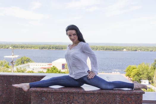 Photo of young woman in pose twine