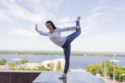 Photo of young woman on river background