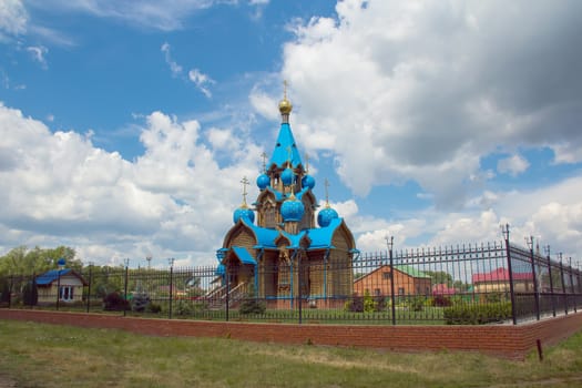 Russian province orthodoxy church with blue cupolas