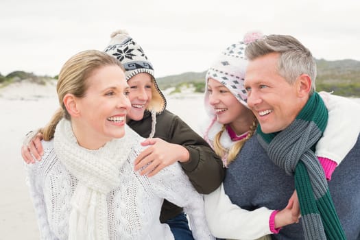 Happy family enjoying a nice day out at the beach