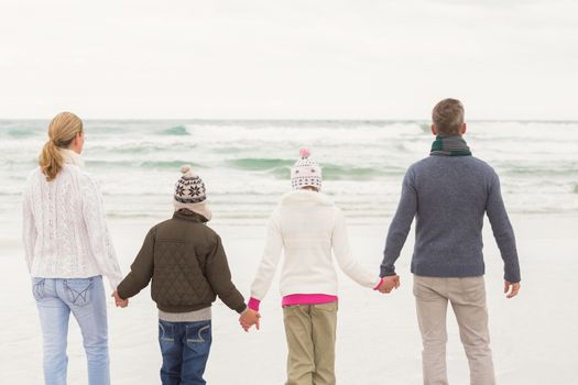 Happy family enjoying a nice day out at the beach