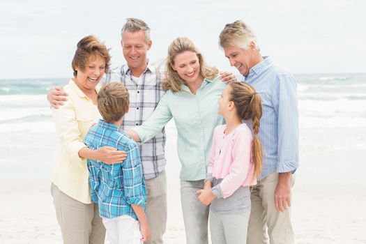 Multi generation family all together at the beach