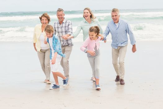 Multi generation family all together at the beach