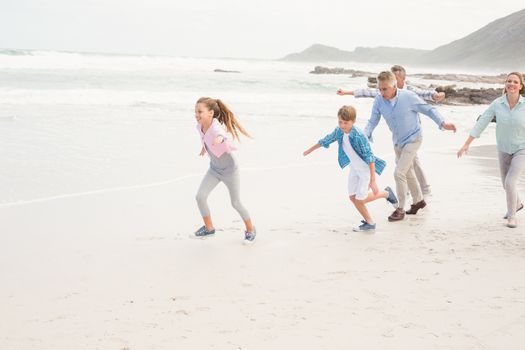 Multi generation family all together at the beach