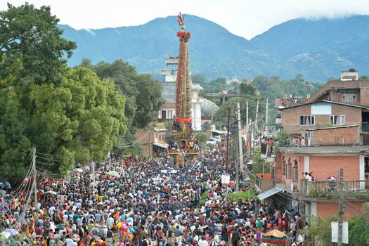 NEPAL, Patan: The restored chariot makes its way through Patan, Nepal as Hindu and Buddhist devotees celebrate the festival of rain god Rato Machindranath on September 22, 2015. The festival takes place each April, but was delayed this year after a devastating earthquake damaged the chariot that devotees pull through the area in the hope of securing a good harvest.