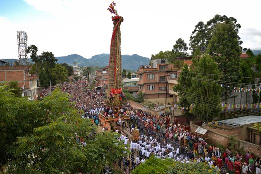 NEPAL, Patan: The restored chariot makes its way through Patan, Nepal as Hindu and Buddhist devotees celebrate the festival of rain god Rato Machindranath on September 22, 2015. The festival takes place each April, but was delayed this year after a devastating earthquake damaged the chariot that devotees pull through the area in the hope of securing a good harvest.