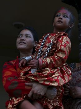 NEPAL, Patan: Hindu and Buddhist devotees celebrate the festival of rain god Rato Machindranath in Patan, Nepal on September 22, 2015. The festival takes place each April, but was delayed this year after a devastating earthquake damaged the chariot that devotees pull through the area in the hope of securing a good harvest.