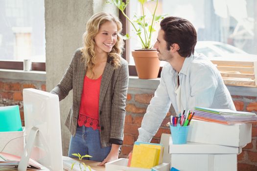 Business people discussing in creative office