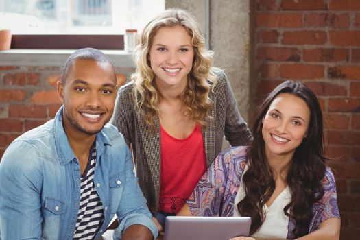 Portrait of happy team in creative office