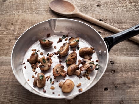 close up of rustic pan sauteed mushroom